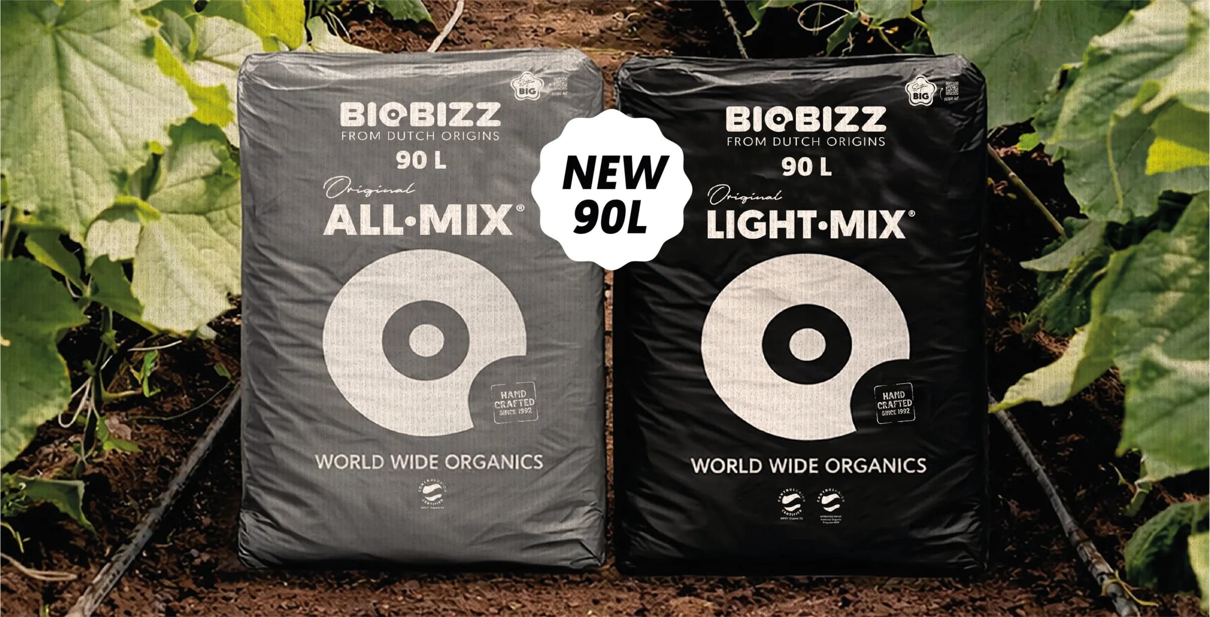 The new 90 litre All·Mix and Light·Mix bags standing side by side in a cucumber bed.